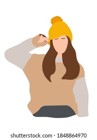 Beautiful portrait of a woman in winter. Smiling girl wearing warm clothes having fun. She is wearing hat and sweater isolated on white wall