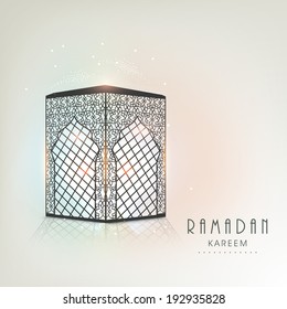 Beautiful poster, banner or greeting card design with Arabic lamp or lantern on colourful shiny background for holy month of Ramadan Kareem.