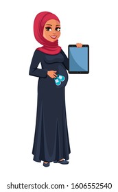 Beautiful pregnant Muslim woman in hijab holding tablet and baby shoes. Cute Arab lady prepares to be a mother. Muslin girl cartoon character. Vector illustration on white background
