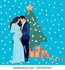 A beautiful pregnant woman in a blue dress with a man in a trouser suit stands near a Christmas tree with gifts, celebrating Christmas, New Year