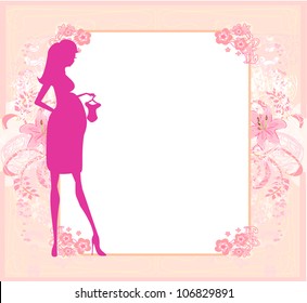 Beautiful pregnant woman on shopping for her new baby- abstract background