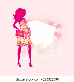  Beautiful pregnant woman on shopping for her new baby- abstract