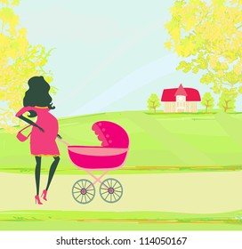  beautiful pregnant woman pushing a stroller