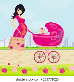 beautiful pregnant woman pushing a stroller with her daughter