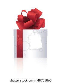 Beautiful present with red ribbon and label on a white background
