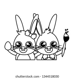 beautiful rabbits couple with egg and paintbrush