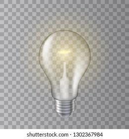 Beautiful realistic vector lit light bulb on transparent background.