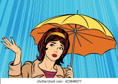 Beautiful sad girl in rain with umbrella, bad weather