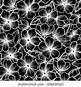 Beautiful seamless background in black-and-white style. Blossoming branches of trees. Outline of flowers. Symbol of spring.