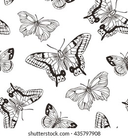 Beautiful seamless background of butterflies black and white colors.  Vector illustration. Simple stylish hand drawn design for fabric, paper and wallpaper.
