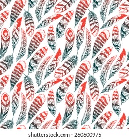 beautiful seamless background with green and orange feathers