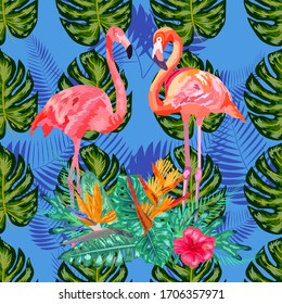 Beautiful seamless floral exotic pattern with tropical flowers, palm leaves, jungle plants, hibiscus, bird of paradise flower, pink flamingos