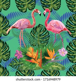 Beautiful seamless floral exotic pattern with tropical flowers, palm leaves, jungle plants, hibiscus, bird of paradise flower, pink flamingos