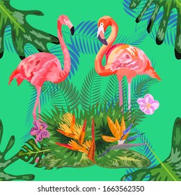 Beautiful seamless floral pattern background with pink flamingos, tropical flowers.