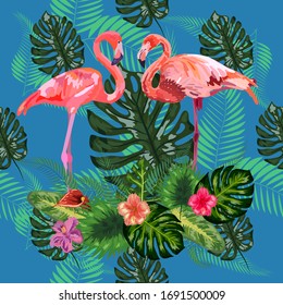 Hermoso fondo floral sin fisuras con flamencos rosas, flores tropicales.
