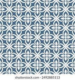 Beautiful seamless floral pattern, with white four-petal leaf shapes on a blue background. Suitable for various design purposes of textiles, tiles, wallpapers, backgrounds, etc.