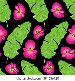 Beautiful seamless green botanical background as bright tropical flowers and banana palm tree leaves for your decoration