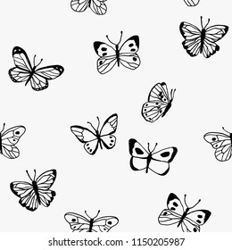 Beautiful seamless pattern with black butterflies