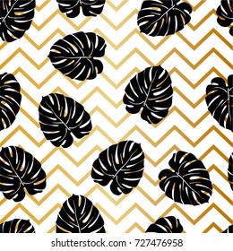 Beautiful seamless pattern with black tropical leaf on a gold zig zag background, trendy fashion textile print, pop art design. Retro 80s style.