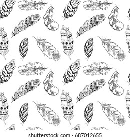 Beautiful seamless pattern with feathers in boho style in black and white colors. Sketch vector illustration. Native American, ethnic background