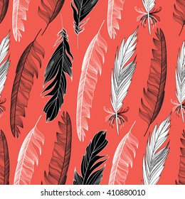 Beautiful seamless pattern with feathers on a red background