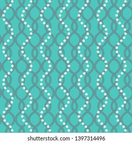 Beautiful seamless pattern of flowers and chains. Summer print on blue background