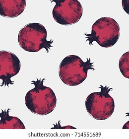 Beautiful seamless pattern with red pomegranates hand drawn in elegant antique style. Ripe fresh fruits on light background. Natural vector illustration for wrapping paper, fabric print, wallpaper.