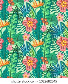 Beautiful seamless pattern with ropical jungle palm leaves, exotic flowers. Colorful nature floral endless background.