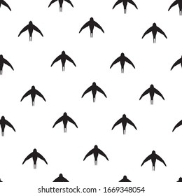 Beautiful seamless pattern with silhouette swallow birds. Perfect vector illustration.