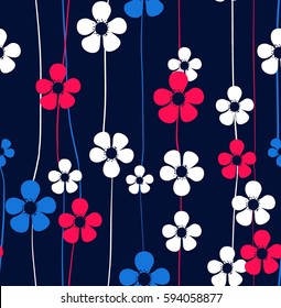 Beautiful seamless pattern in small abstract flower. dark background. spring flowers.