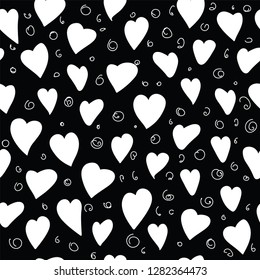 Beautiful seamless pattern with small hearts. Black and white. Background romantic design. Design elements for Valentine's day.
