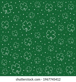 Beautiful Seamless Pattern With White Shamrock On Green Background