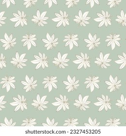 Beautiful seamless tropical pattern with golden leaves on a pale green background. Pattern for textiles, wrapping paper, wallpapers, backgrounds, decor.