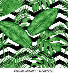 Beautiful seamless vector floral pattern tropical jungle leaves on a geometric background