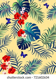 Beautiful seamless vector floral summer pattern background with tropical palm leaves. Template for wallpapers, web page backgrounds, textile, swimwear.
