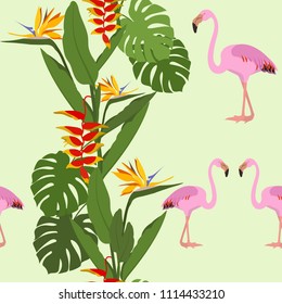Beautiful seamless vector illustration with tropical plants and flamingos on a yellow background. For decorating textiles, packaging and wallpaper.