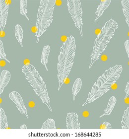 Beautiful seamless vector pattern with feathers.