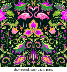 Beautiful seamless wallpaper with exotic flowers, tropical leaves and pink flamingo for carpet, fabric, textile and wrapping paper