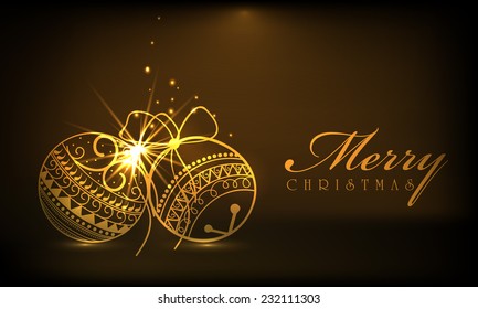 Beautiful shiny golden X-mas ball on brown background for Merry Christmas celebrations.