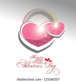 Beautiful shiny heart valentines day festival with gray background.