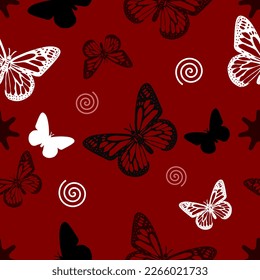 Beautiful silhouette butterfly seamless pattern with a red background for fabric or wallpaper