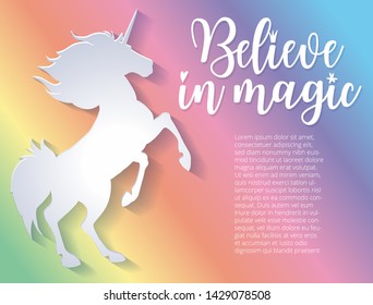 Beautiful silhouette of unicorn in paper cut style. Colorful rainbow background. Typography poster. Believe in magic slogan.
