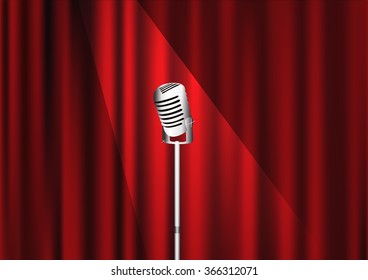 Beautiful silver microphone closeup on the red curtain background