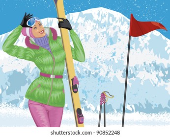 Beautiful skier with skis on top of snowy mountain