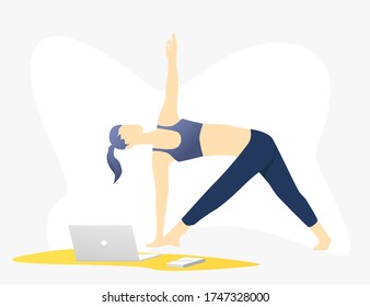 Beautiful slim girl in the top is engaged in online training. A young woman is looking at a laptop on a stretching course. Blue and yellow design.