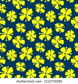 Beautiful small inky yellow flowers isolated on a dark blue background. Cute floral seamless pattern. Vector simple flat graphic hand drawn illustration. Texture.