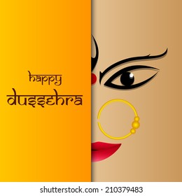 Beautiful smiling face of Goddess Durga on brown and yellow background with the stylish text for Dussehra festival celebrations. 