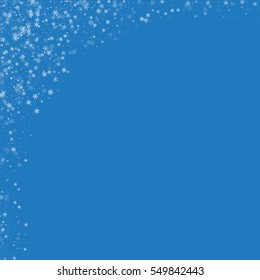 Beautiful snowfall. Abstract left top corner with beautiful snowfall on blue background. Vector illustration.