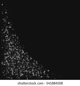 Beautiful snowfall. Bottom left corner with beautiful snowfall on black background. Vector illustration.