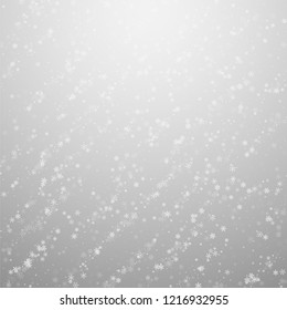 Beautiful snowfall Christmas background. Subtle flying snow flakes and stars on light grey background. Adorable winter silver snowflake overlay template. Unusual vector illustration.